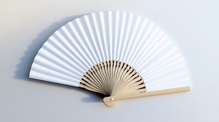 A mock-up of a white folding hand fan. White background.