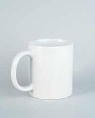 Two-tone 11oz mug on isolated background. Mug with black handle and inner part.