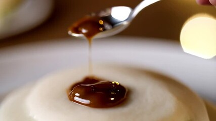 Unique Culinary Creation Featuring a Delicate Mousse With Flavorful Topping in Modern Dining Setting