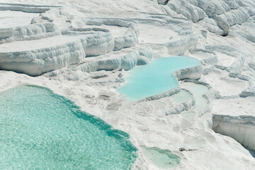 View of beautiful travertine terraces and natural formations, Pamukkale, Turkey.