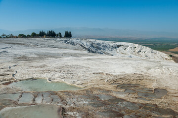 View of beautiful travertine terraces and natural formations, Pamukkale, Turkey.