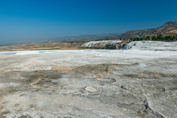 View of beautiful travertine terraces and natural formations, Pamukkale, Turkey.