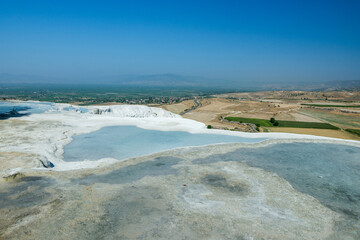 View of beautiful travertine terraces and natural formations, Pamukkale, Turkey.