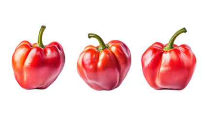 A trio of vibrant red bell peppers with green stems arranged in a line, ideal for health food advertising copy space.