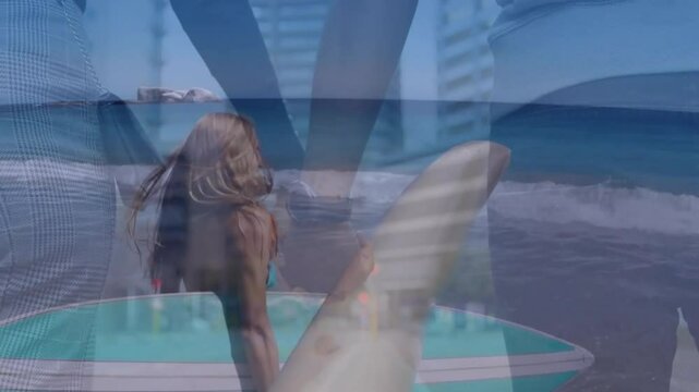 Riding wave, surfer with animation overlay of abstract patterns and beach scenery