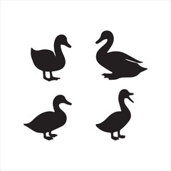 set of silhouettes of ducks