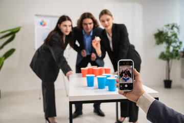 Office Team Building Game Involving Table and Cups