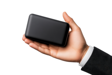 Businessman s hand holding a sleek modern tech gadget box against a plain white background The businessman is dressed professionally in a suit suggesting a corporate or office environment