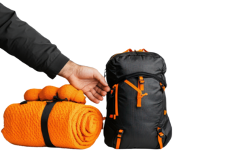 Cropped view of a rugged male hand firmly gripping and holding a sturdy camping gear box or backpack suggesting an upcoming outdoor wilderness expedition