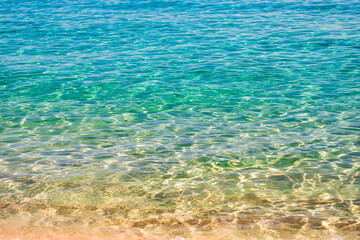 Aquamarine ocean nature. Background of clear turquoise sea water. Idyllic summer vacation....
