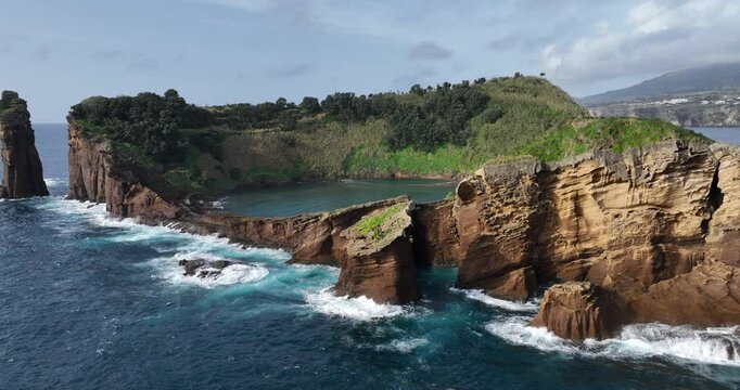 Small island in front of the coast of Sao Miguel, Azores, Portugal.