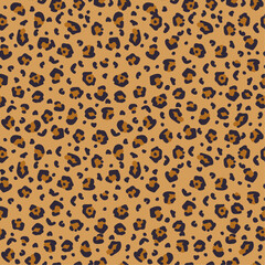 Seamless leopard print pattern with black and brown spots on a tan background. Perfect for textiles, fashion, wallpaper, fabric, packaging, and digital design. High-quality animal print texture.