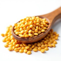 A wooden spoon holds a vibrant pile of yellow lentils symbolizing nutritious meal preparation. These versatile legumes inspire chefs to explore new flavors in the kitchen.
