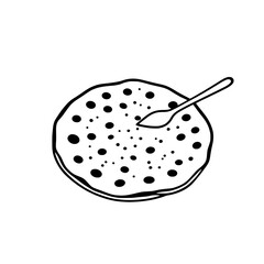Round Flatbread With Dots And Small Spoon