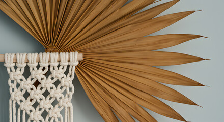 Wall Mounted Dried Palm Frond in a Macrame Holder For Home Decoration
