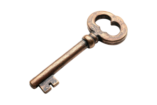 A vintage key rests upon a bright surface, showcasing its intricate design and timeless beauty