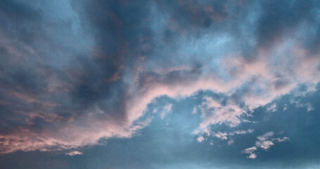 Obraz premium Clouds in the sky. Overcast weather. Storm clouds over the mountains. Clouds containing rain. Cloudy weather