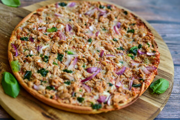 High protein low carb pizza with tuna onion and vegetables.
 Ketogenic diet food 