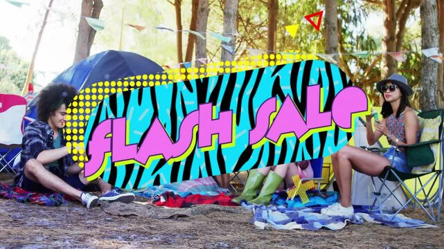 Flash Sale text animation over people relaxing at campsite with tents