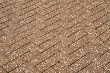 New herringbone concrete pavers with added gravel or quartz stone for texture