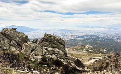 Greece. Aerial view of Athens city from Penteli mount, cloudy blue sky