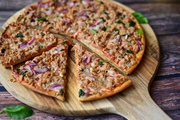 High protein low carb pizza with tuna onion and vegetables.
 Ketogenic diet food 