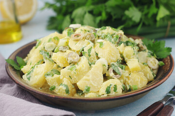 A bowl with Greek potato salads	