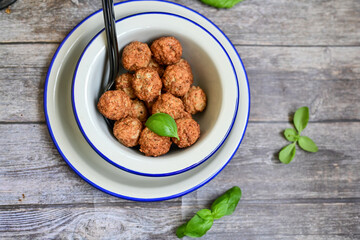 Mini pork meatballs with salsa filling.
 Party fingerfood. Diet  ketogenic food.