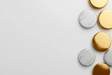 Shiny gold and silver coins arranged on a light background, highlighting their metallic textures.