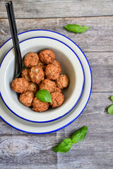 Mini pork meatballs with salsa filling.
 Party fingerfood. Diet  ketogenic food.