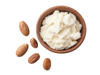 Almond butter in a wooden bowl with whole almonds scattered on a transparent background, cut out