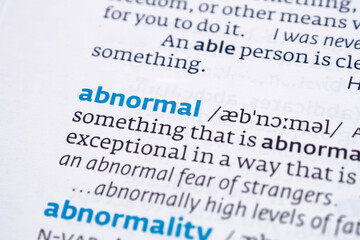Examining meaning of abnormal and how it signifies a departure from what is considered normal or typical.