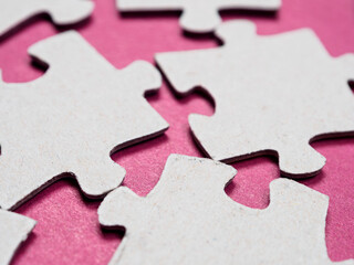 Puzzles create a unique background, symbolizing unity and harmony, revealing deep semantic...