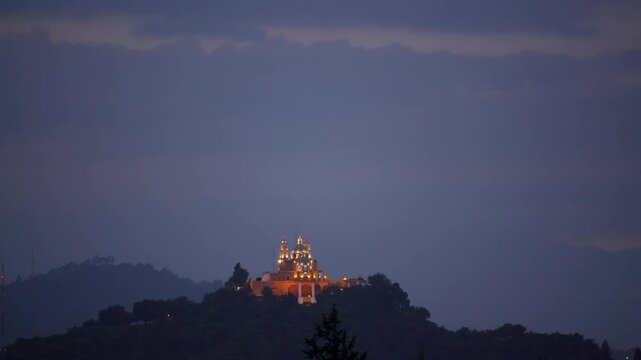 
Video of Santuario de la Virgen de los Remedios, Cholula, Popocatepetl and Iztacc&iacute;huatl during daytime with sky and clouds