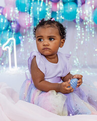 Beautiful baby, black girl, dressed as a princess celebrating her 1st birthday on a beautiful...