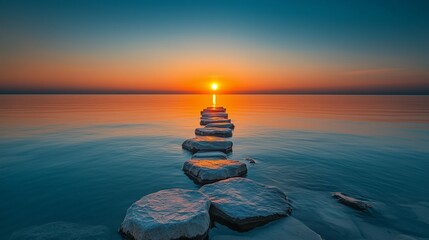 A tranquil sunset casting warm golden and amber hues over a serene Zen path made of smooth, polished stones above still water.