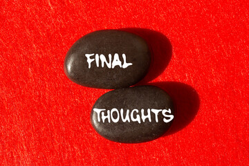 Final thoughts message written on black stones on red background. Conceptual final thoughts symbol....