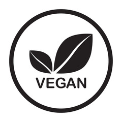 Vegan black vector icon. Organic, bio, eco symbol. Vegan, no meat, lactose free, healthy, fresh and nonviolent food. Round black vector illustration with leaves for stickers, labels, web and logos.