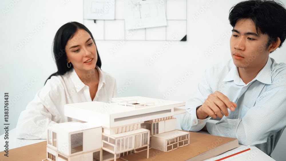 Aufkleber closeup image of cooperate professional architect team working together by measuring house model on 