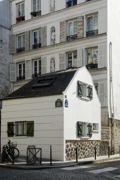 Paris, France. Europe    Charming old white house in Montmatre district.