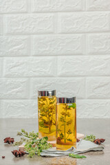 Kombucha Lemon balm beverage. Trendy natural product, healthy lifestyle. Organic probiotic drink