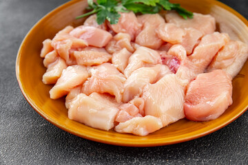 Chicken meat raw pieces meat poultry fresh gourmet food background on table rustic food top view copy space