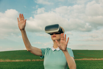 Woman in virtual reality headset exploring outdoor simulation