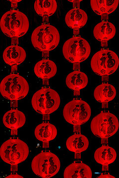 Vibrant red lanterns beautifully illuminated at night in Macau