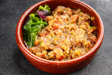 Eggplant dip aubergine salad Baba ganoush eggplant, tomato, onion vegetable dish fresh gourmet food background on table rustic food top view copy spac