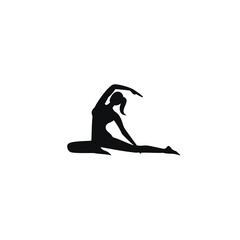 silhouette of a woman doing yoga
