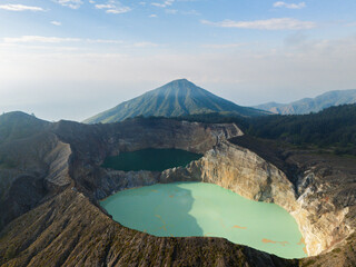 Blue Water of Kelimutu Volcano Indonesia from above with Telezoom Aerial 