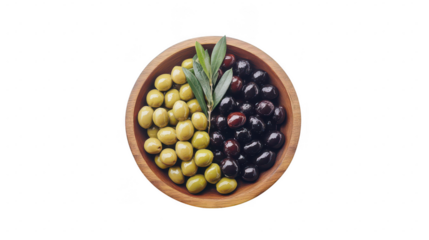 Delicious black green and red olives with leaves in a wooden bowl natural setting close-up view