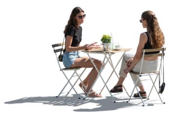 Backlit cut out scene of two women sitting in a street cafe and talking isolated on transparent background