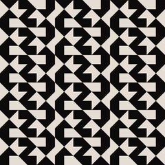 Seamless geometric half square triangle pattern in black and white. Graphical illustration for a unique wall decor, textiles and interior design.

